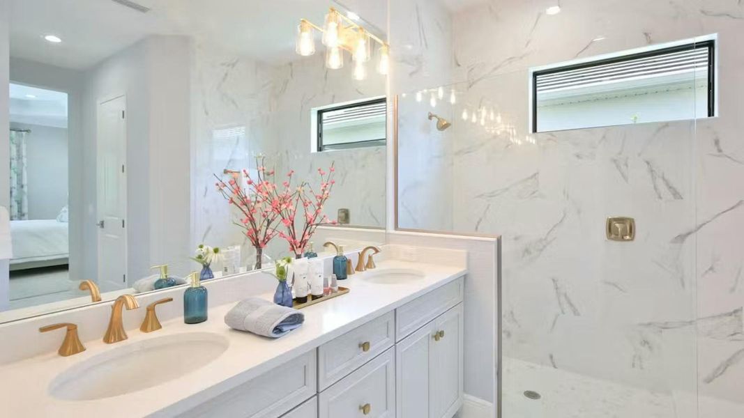 Furnished interior view inside a new home in Boca Royale Golf & Country Club Real Estate and Homes for Sale in Englewood, FL - Neal Communities, Englewood (Image 22). Furnished interior view inside a new home in Boca Royale Golf & Country Club Real Estate and Homes for Sale in Englewood, FL - Neal Communities, Englewood (Image 22).