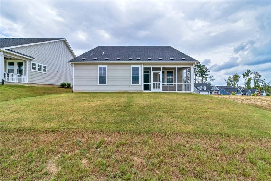 Exterior details and patio area of a home in Sinclair at Crawford Creek, Grovetown (Image 22).