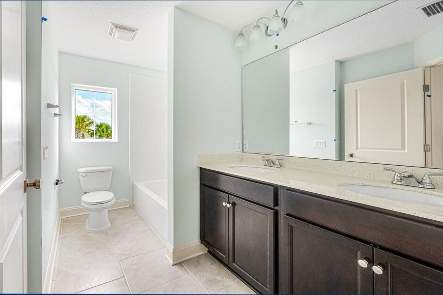 Representative furnished interior of a home built from the Sebring by Riverside Homes in Mariposa at EverRange, Jacksonville (Image 54).
