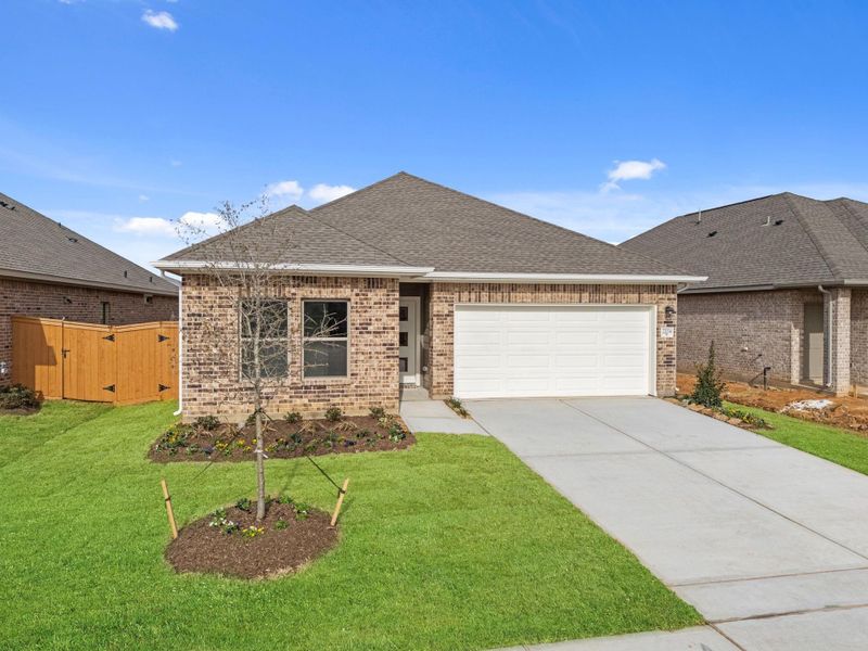 Front exterior of a new home in Cypress Green, Hockley, TX, highlighting curb appeal (Image 19).
