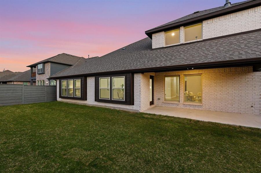 Exterior details and patio area of a home in Union Park, Little Elm (Image 28). Exterior details and patio area of a home in Union Park, Little Elm (Image 28).