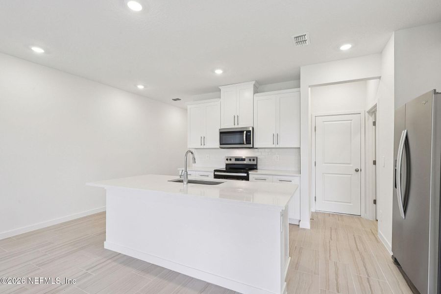 Furnished interior view inside a new home in , St. Augustine (Image 9).