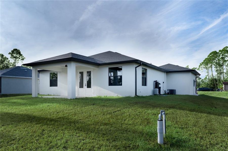 Exterior details and patio area of a home in , North Port (Image 4).