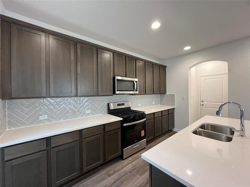 Furnished interior view inside a new home in Wellspring, Round Rock (Image 4).