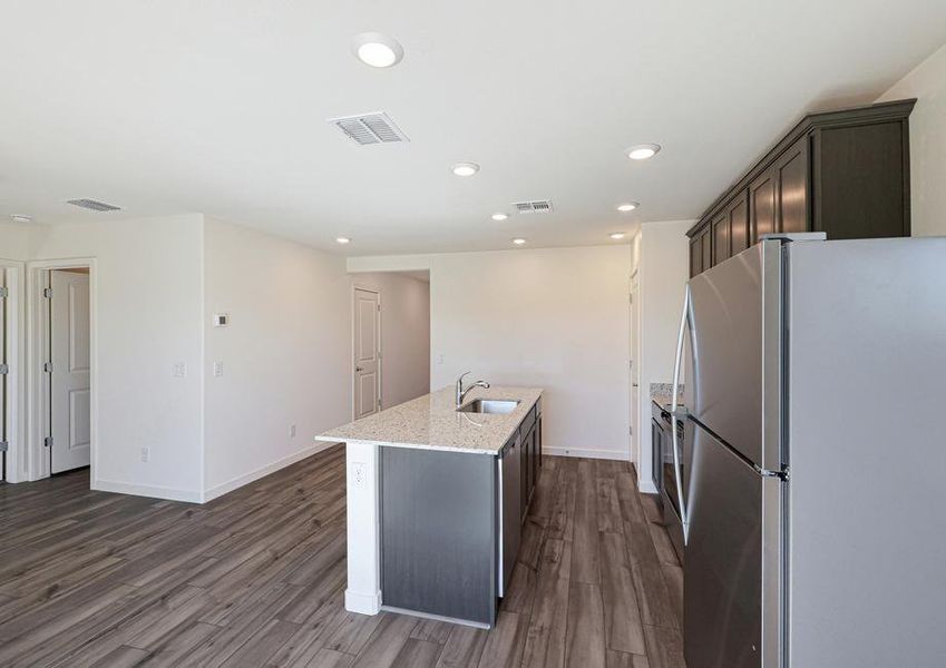 The kitchen comes with a full suite of stainless steel appliances!