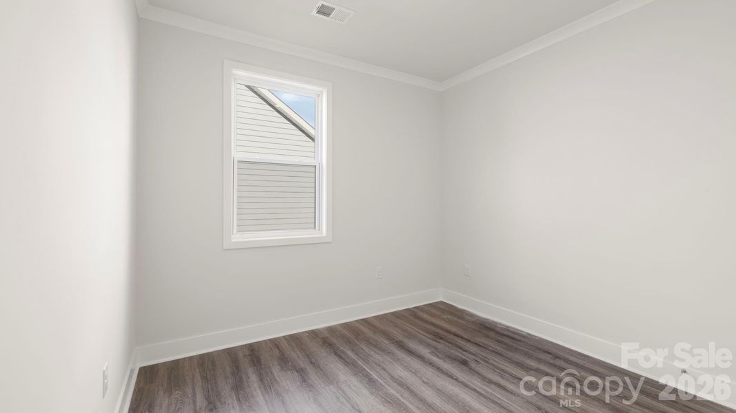 Spacious, unfurnished interior of a new home in Tap Root Farms, Hendersonville (Image 14).