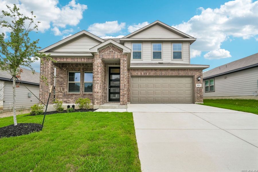 Front exterior of a new home in Royal Crest, San Antonio, TX, highlighting curb appeal (Image 23).