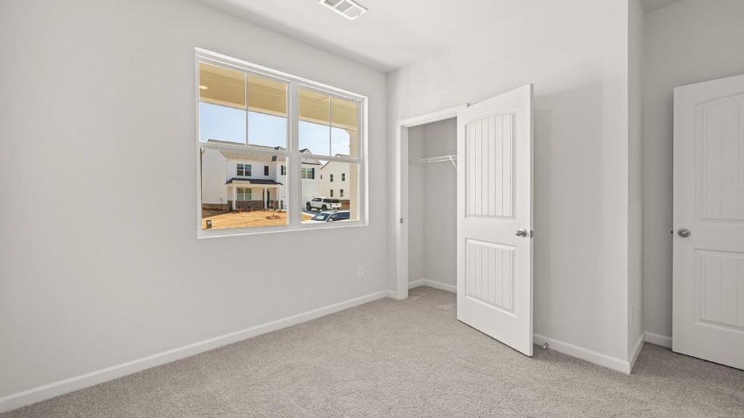 Spacious, unfurnished interior of a new home in Parkside at Carter Grove, Cartersville (Image 22).