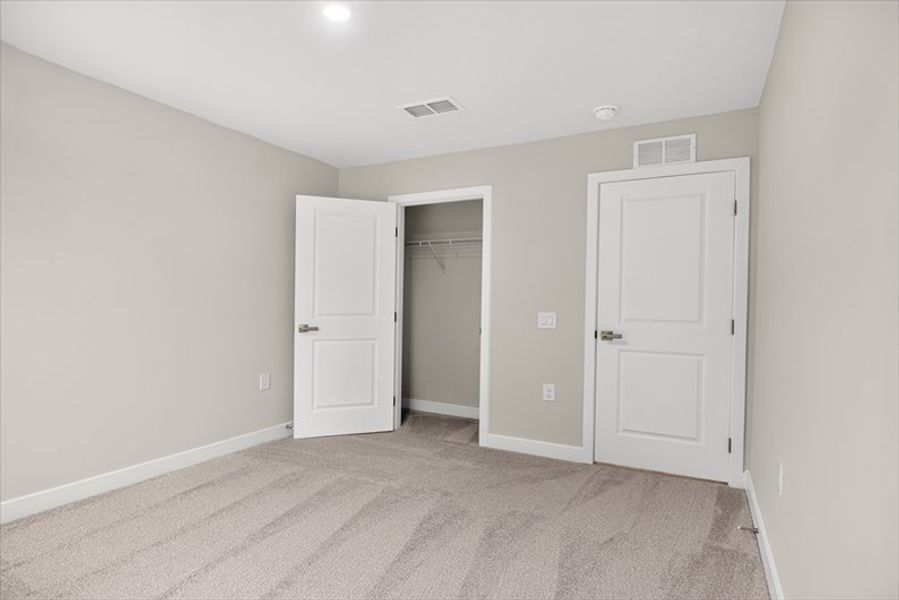 Spacious, unfurnished interior of a new home in Arden Woods, Greenville (Image 18).