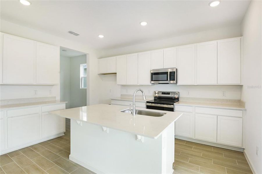 Furnished interior view inside a new home in Seasons at Grandview Gardens, Deland (Image 9). Furnished interior view inside a new home in Seasons at Grandview Gardens, Deland (Image 9).