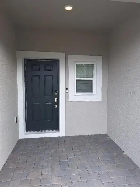 Exterior details and patio area of a home in , Edgewater (Image 3).