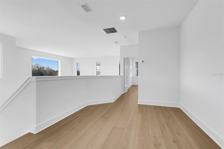 Spacious, unfurnished interior of a new home in Hampton Green at Providence, Davenport (Image 45).