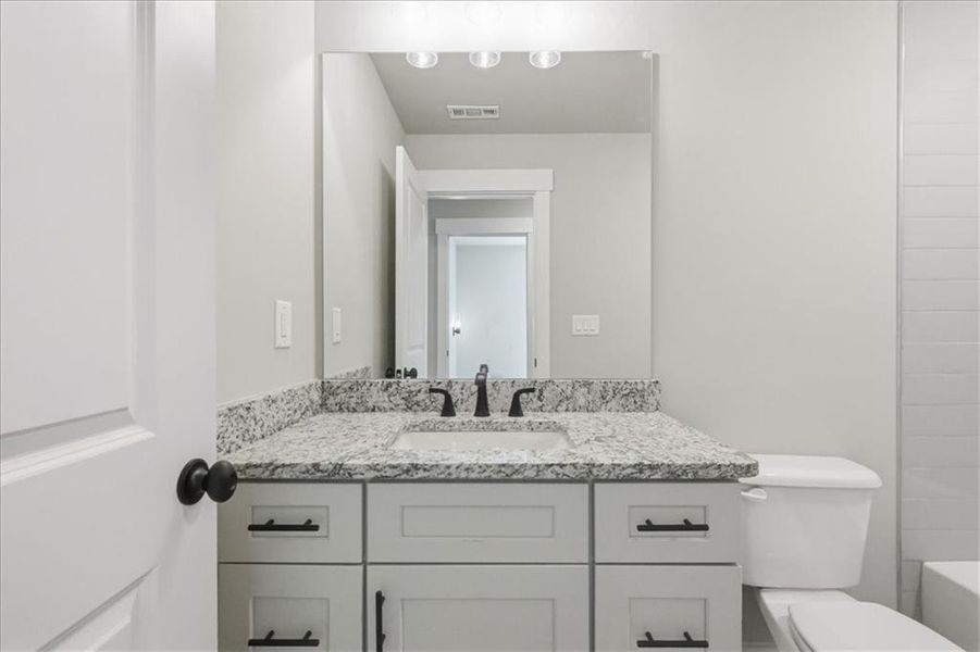 Furnished interior view inside a new home in , Statham (Image 17).