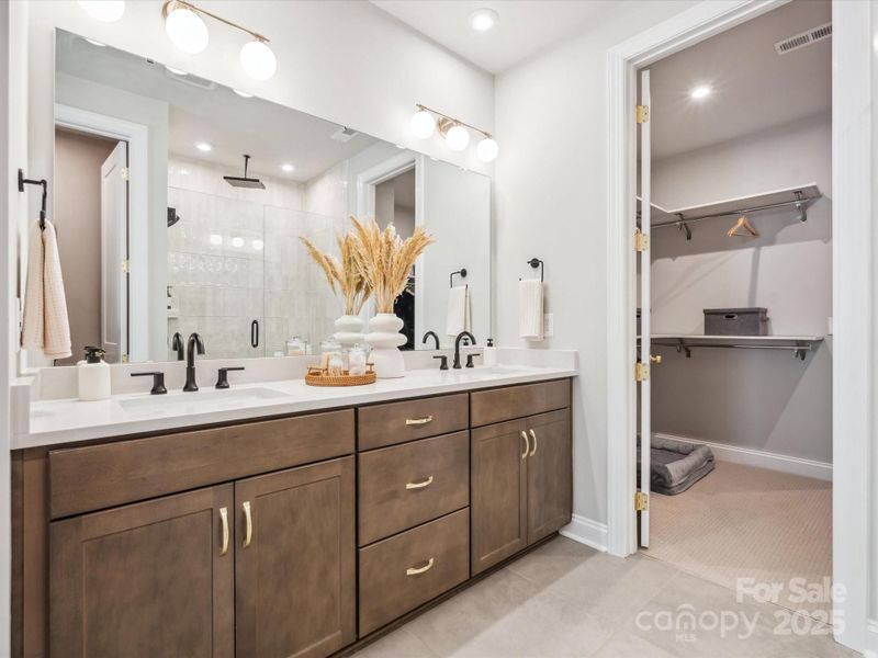 Primary Bath with Dual Vanity and Loads of Storage. *Model Photos | Actual Finishes, Structural Selections, and Orientation May Vary.
