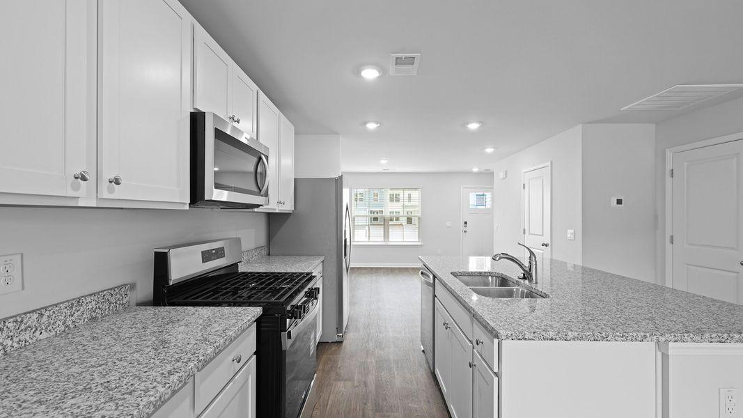 Representative furnished interior of a home built from the MURRAY TH by D.R. Horton in Pine Hills Townhomes at Cane Bay, Summerville (Image 6).