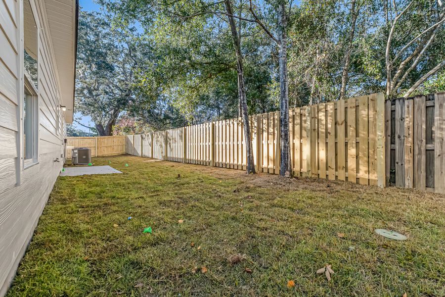 Exterior details and patio area of a home in Live Oak Cottages, Freeport (Image 29). Exterior details and patio area of a home in Live Oak Cottages, Freeport (Image 29).