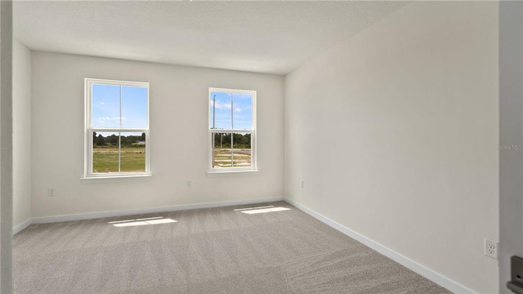 Spacious, unfurnished interior of a new home in Willowbrook North, Winter Haven (Image 32).