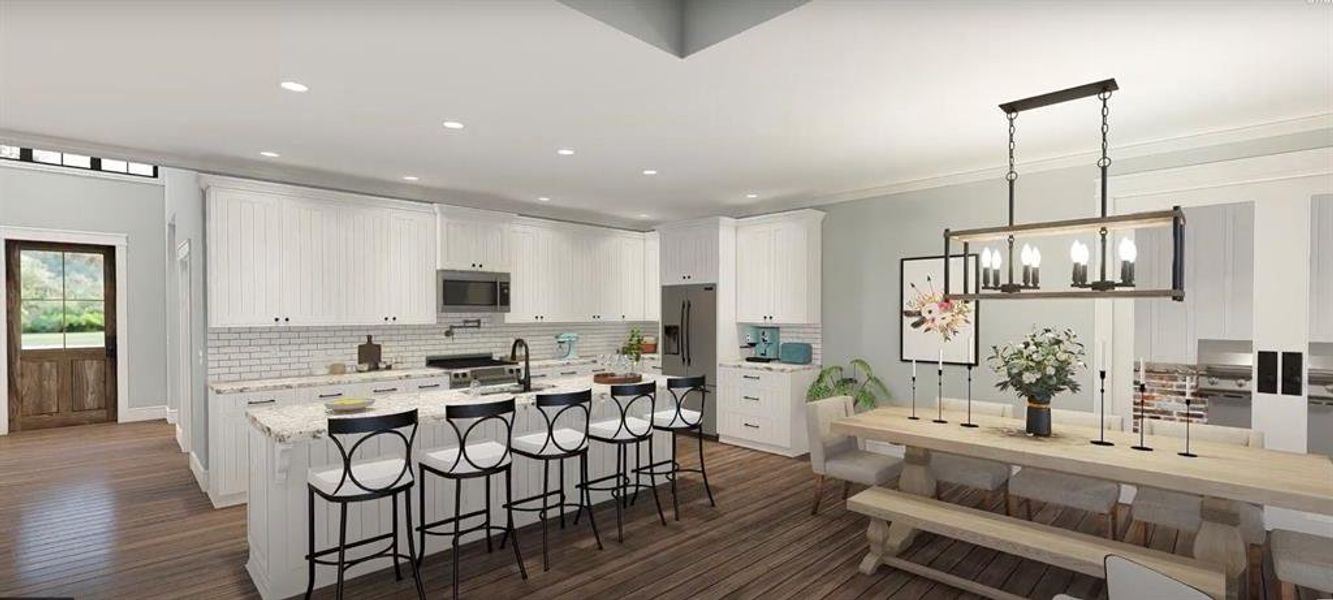 Kitchen featuring light stone counters, stainless steel appliances, dark hardwood / wood-style flooring, an island with sink, and a breakfast bar area