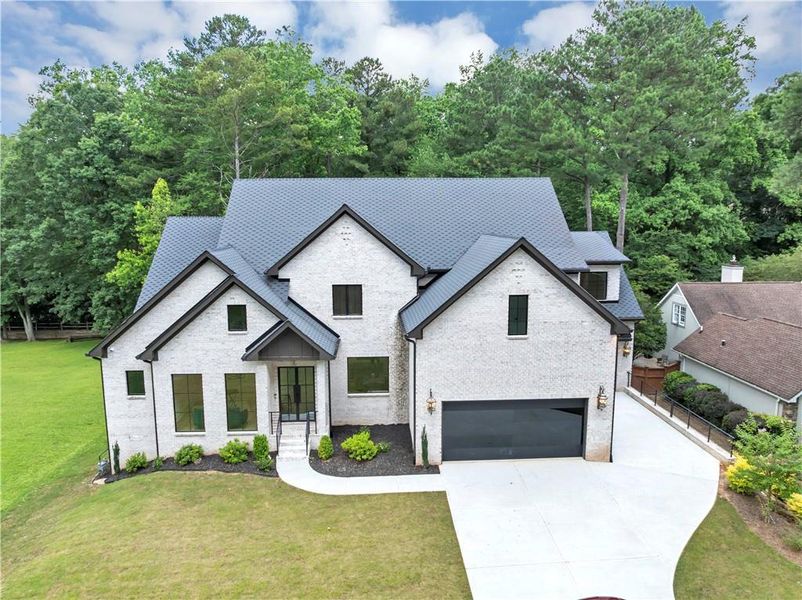 Front exterior of a new home in , Marietta, GA, highlighting curb appeal (Image 26).