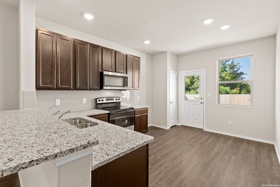 Furnished interior view inside a new home in Blue Ridge Ranch, San Antonio (Image 4).