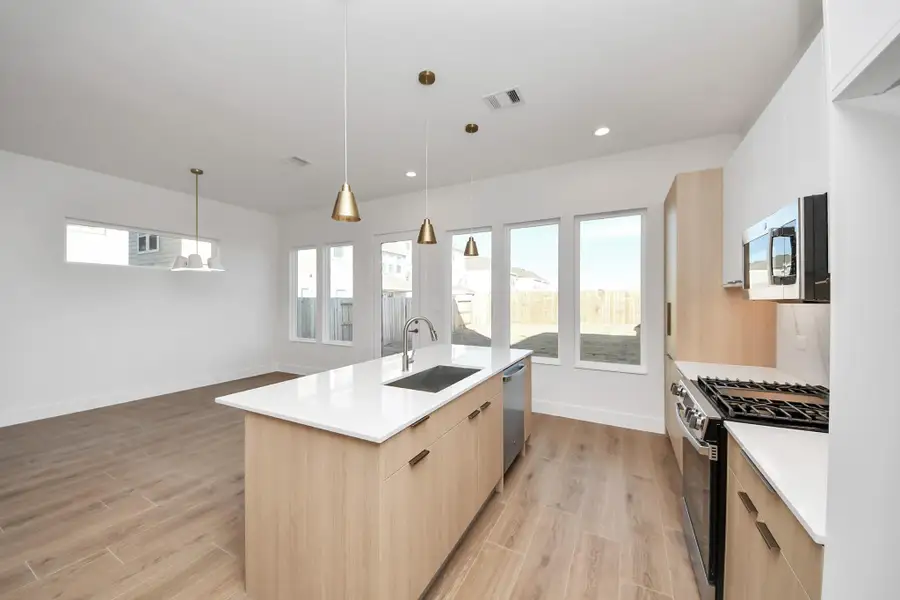 Furnished interior view inside a new home in Piccolina, Houston (Image 6).