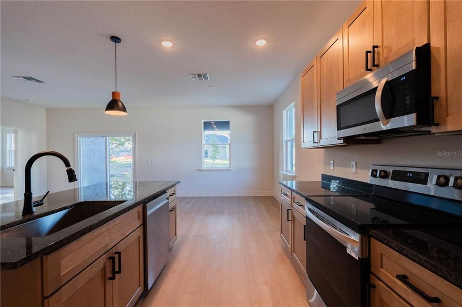 Furnished interior view inside a new home in , Tavares (Image 11).