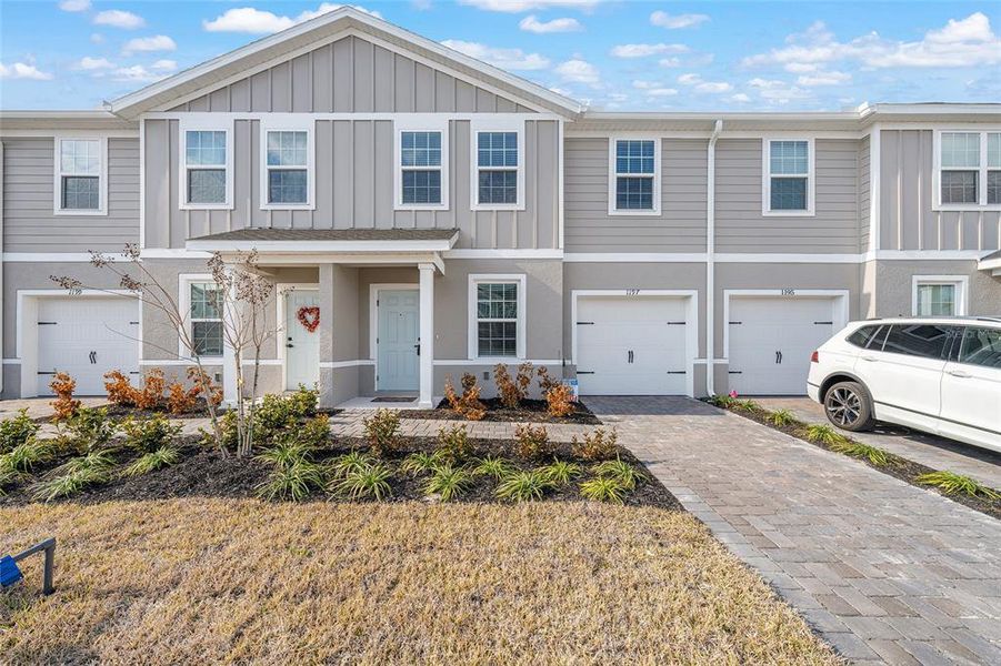 Front exterior of a new home in , Lady Lake, FL, highlighting curb appeal (Image 28). Front exterior of a new home in , Lady Lake, FL, highlighting curb appeal (Image 28).