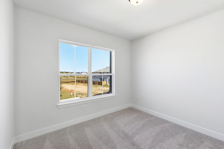 Spacious, unfurnished interior of a new home in The Colony, Bastrop (Image 24).
