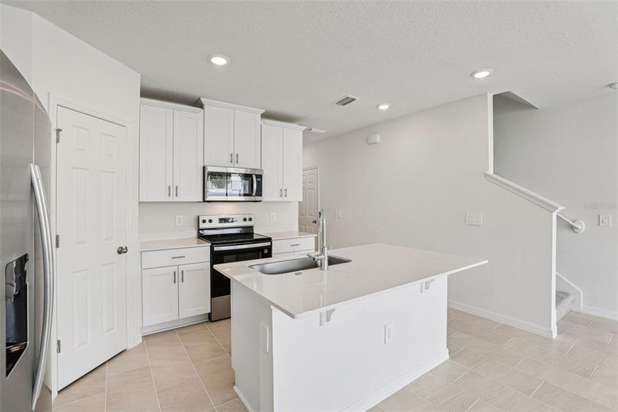 Furnished interior view inside a new home in Cagan Crossings West, Clermont (Image 6).