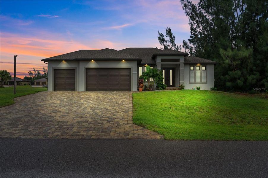 Front exterior of a new home in , Port Charlotte, FL, highlighting curb appeal (Image 2). Front exterior of a new home in , Port Charlotte, FL, highlighting curb appeal (Image 2).