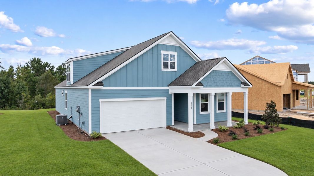 Front exterior of a new home in Sheep Island, Summerville, SC, highlighting curb appeal (Image 2). Front exterior of a new home in Sheep Island, Summerville, SC, highlighting curb appeal (Image 2).