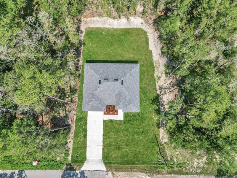 Front exterior of a new home in , Citrus Springs, FL, highlighting curb appeal (Image 25).