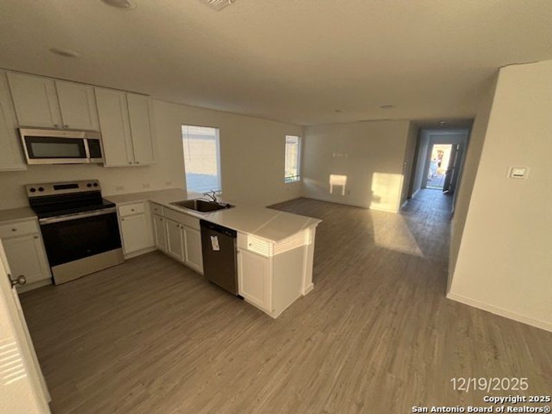 Furnished interior view inside a new home in , Seguin (Image 3).