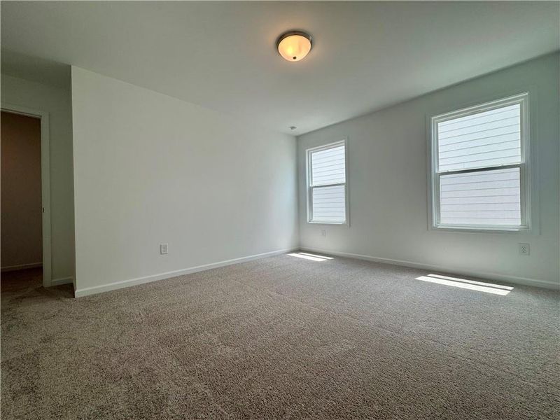 Spacious, unfurnished interior of a new home in Eastlyn Crossing - Single Family, Flowery Branch (Image 20). Spacious, unfurnished interior of a new home in Eastlyn Crossing - Single Family, Flowery Branch (Image 20).