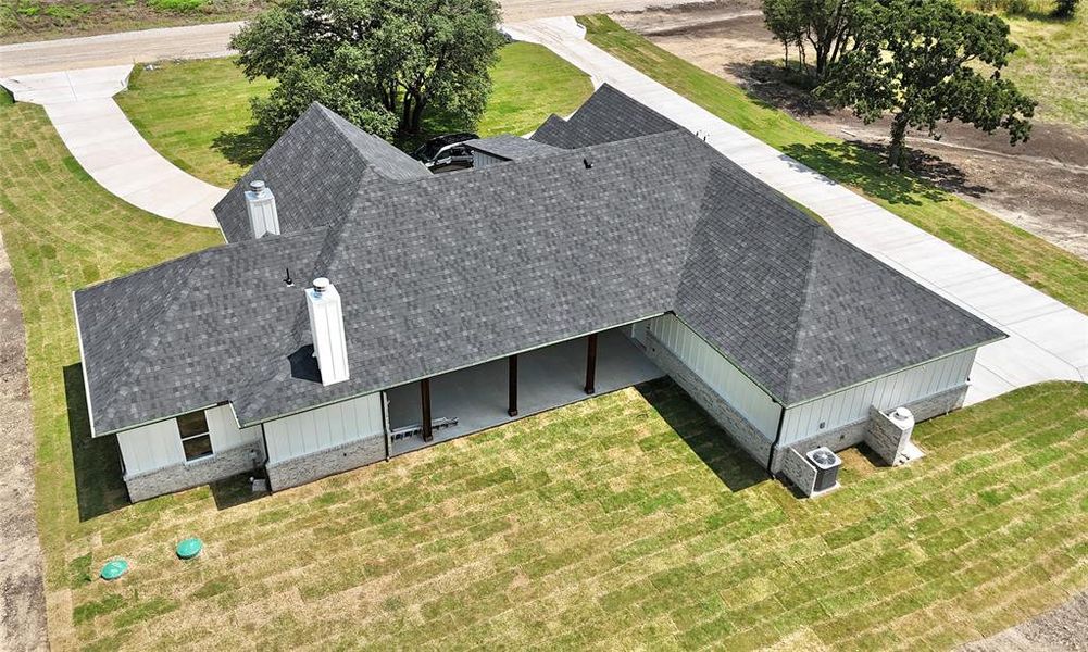 Front exterior of a new home in , Weatherford, TX, highlighting curb appeal (Image 31).