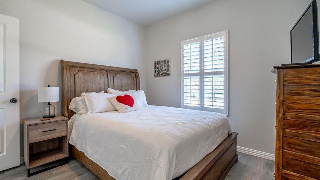 Bedroom featuring light hardwood / wood-style flooring