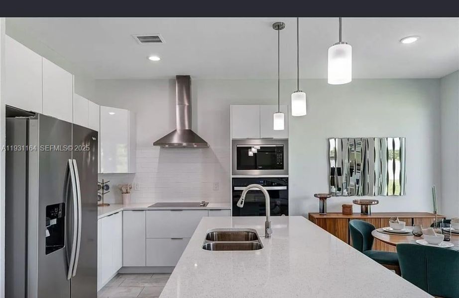 Furnished interior view inside a new home in , Labelle (Image 11).