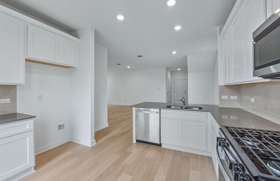 Furnished interior view inside a new home in Larson Crossing, Elgin (Image 9).