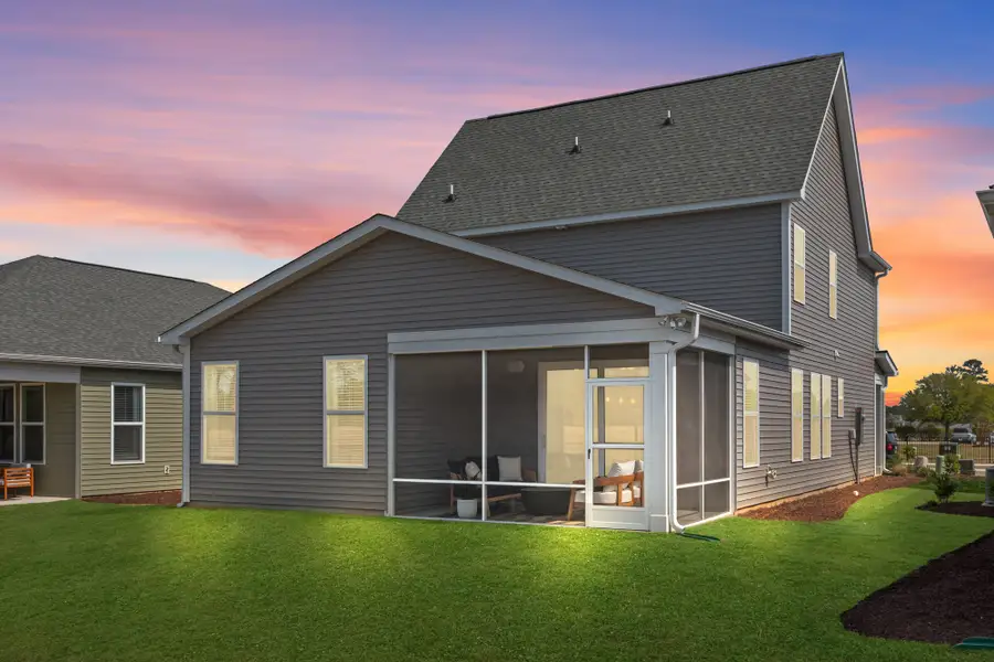 Exterior details and patio area of a home in Terrapin, Leland (Image 3).