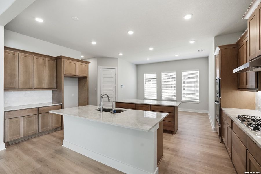 Furnished interior view inside a new home in Potranco Oaks, Castroville (Image 11).