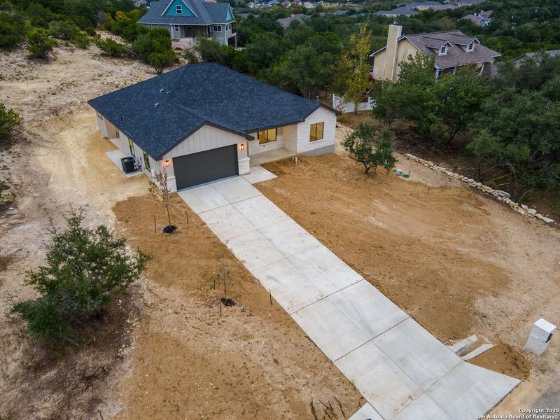 Exterior details and patio area of a home in , San Antonio (Image 26).
