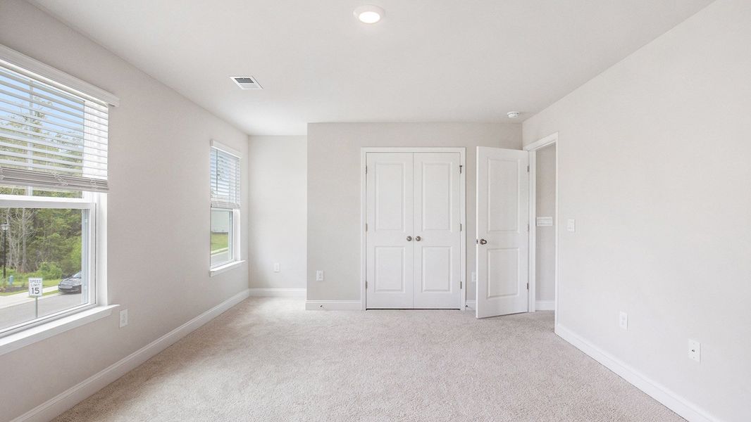 Spacious, unfurnished interior of a new home in Auberon Woods, Conway (Image 21).