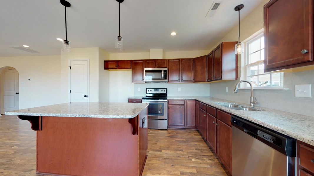 Representative furnished interior of a home built from the Rockbridge by Bill Clark Homes in Davenport Farms, Winterville (Image 17).