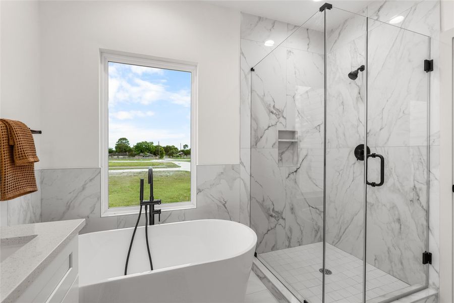 Primary Bath – Previous work by the builder in the community, not representation of exact unit listed. Primary Bath – Previous work by the builder in the community, not representation of exact unit listed.