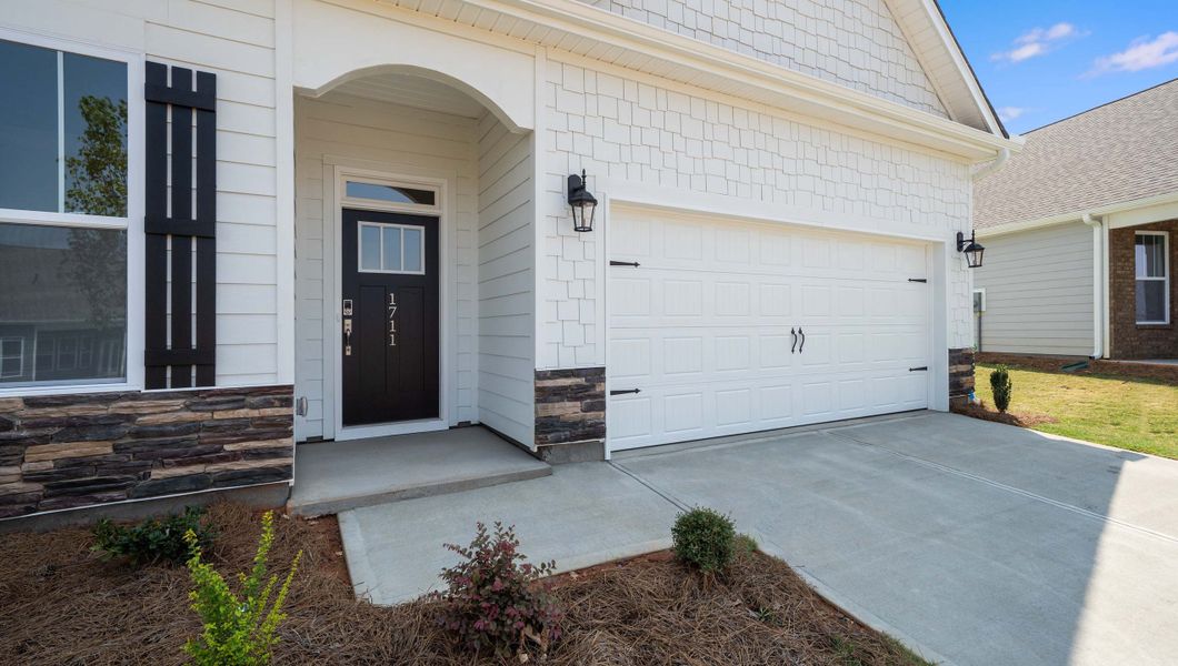 Exterior details and patio area of a home in Adams Glen, Greenville (Image 2). Exterior details and patio area of a home in Adams Glen, Greenville (Image 2).