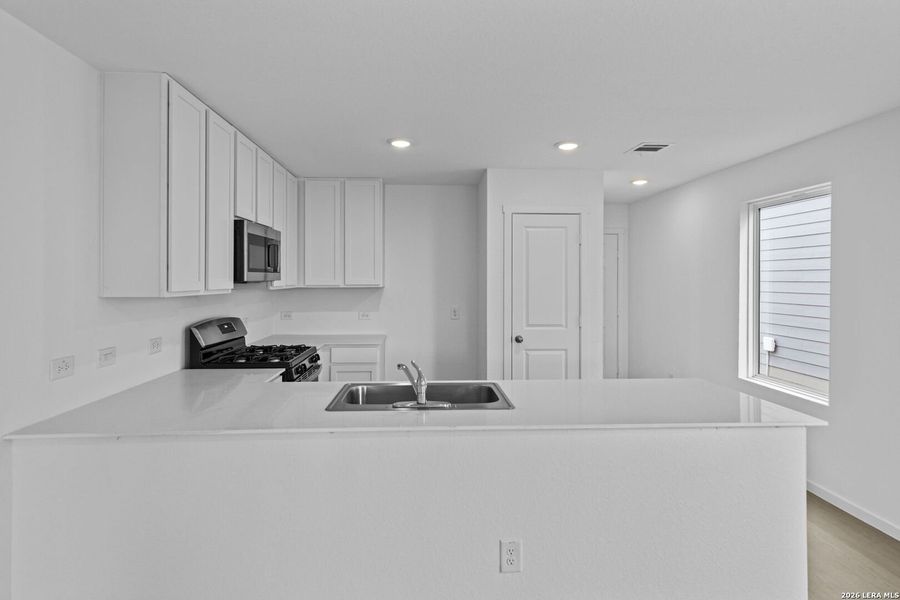 Furnished interior view inside a new home in Spring Grove, St. Hedwig (Image 7).