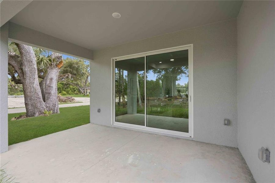 Exterior details and patio area of a home in , Port Charlotte (Image 28).