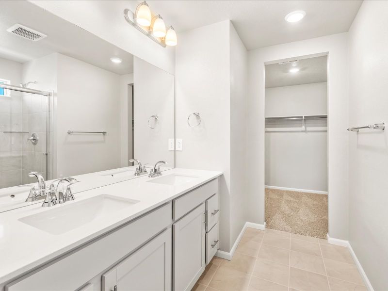 The Snowberry floorplan images taken at a Meritage Homes community in Commerce City, CO.