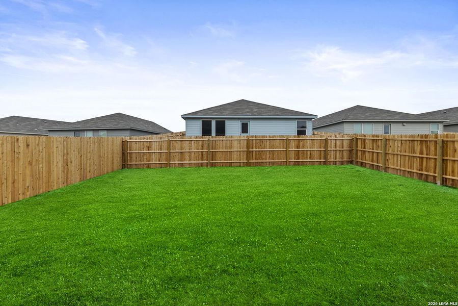 Exterior details and patio area of a home in Voss Farms, New Braunfels (Image 2).