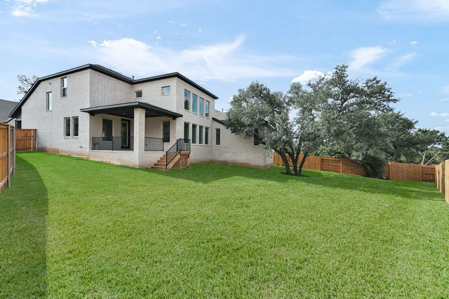 Exterior details and patio area of a home in Parkside on the River 60s, Georgetown (Image 15).